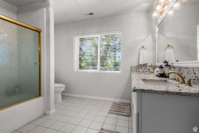 2016 E Graystone Ln S, Draper, UT 84020 - full bath with toilet, vanity, tile patterned flooring, shower / bath combination with glass door, and baseboards