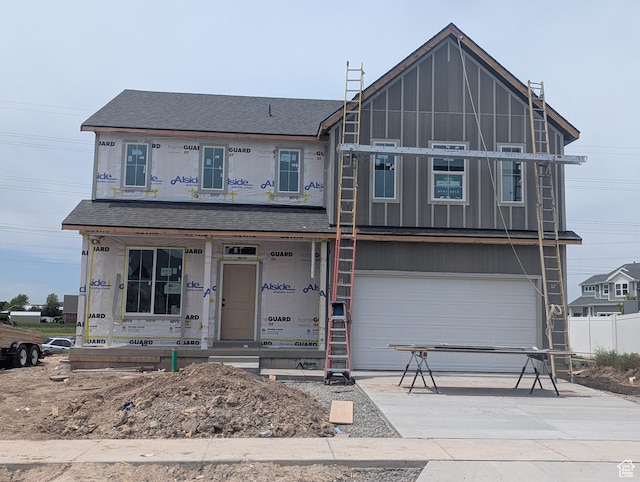 737 N Plainsman Dr Unit 108, Spanish Fork, UT 84660 - property in mid-construction with a garage, concrete driveway, a porch, a shingled roof, and board and batten siding