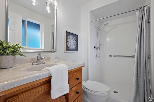2592 S 50 W, Bountiful, UT 84010 - bathroom with vanity, toilet, and a tile shower