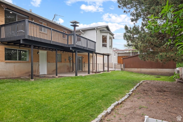 2592 S 50 W, Bountiful, UT 84010 - rear view of property with a wooden deck, a yard, a patio, and brick siding
