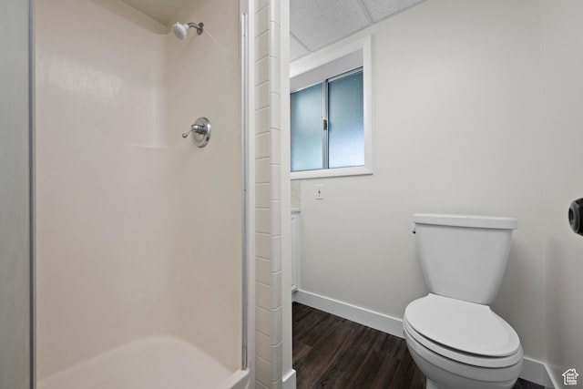 2592 S 50 W, Bountiful, UT 84010 - full bath featuring baseboards, a stall shower, wood finished floors, and toilet