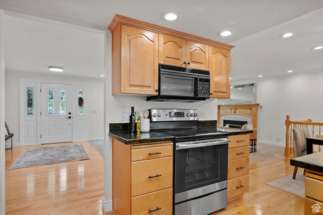 2592 S 50 W, Bountiful, UT 84010 - kitchen featuring black microwave, stainless steel electric range, baseboards, light wood-style floors, and light brown cabinets