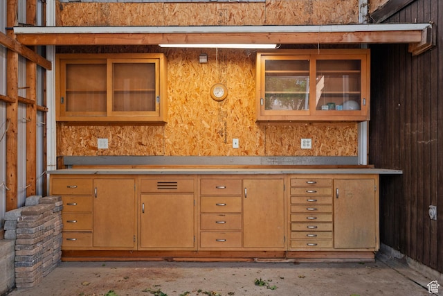 2592 S 50 W, Bountiful, UT 84010 - kitchen with glass insert cabinets, unfinished concrete floors, and light countertops