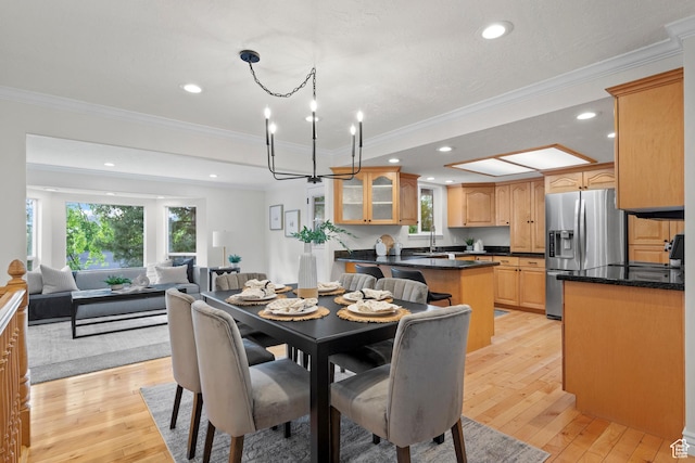 2592 S 50 W, Bountiful, UT 84010 - dining space with light wood-style flooring, ornamental molding, recessed lighting, and a chandelier
