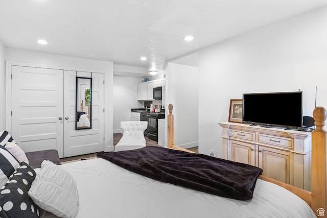 1900 N 1400 E, Provo, UT 84604 - bedroom with recessed lighting, baseboards, wood finished floors, and a closet