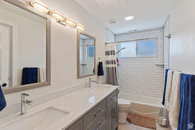 2149 E 3325 N, Layton, UT 84040 - bathroom featuring double vanity, tile patterned floors, shower / tub combo, toilet, and recessed lighting