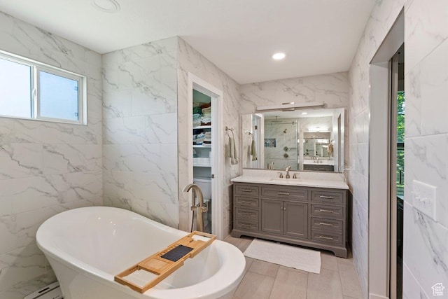 2149 E 3325 N, Layton, UT 84040 - full bath featuring tile walls, vanity, a freestanding bath, a marble finish shower, and recessed lighting