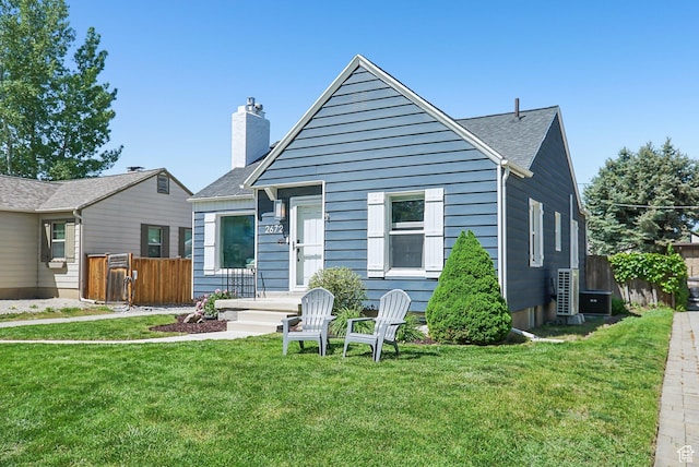 2672 S Filmore St, Salt Lake City, UT 84106 - view of front of property featuring a chimney and roof with shingles