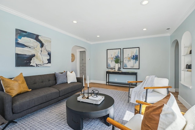 2672 S Filmore St, Salt Lake City, UT 84106 - living area featuring arched walkways, wood finished floors, recessed lighting, ornamental molding, and baseboards