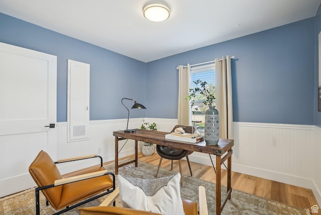 2672 S Filmore St, Salt Lake City, UT 84106 - home office with wood finished floors, a wainscoted wall, and baseboards