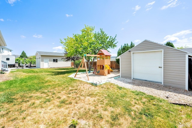 7215 S Aerie Hill Dr W, West Jordan, UT 84081 - view of green lawn featuring an outdoor structure and a playground