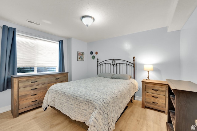 7215 S Aerie Hill Dr W, West Jordan, UT 84081 - bedroom with light wood-style flooring and baseboards