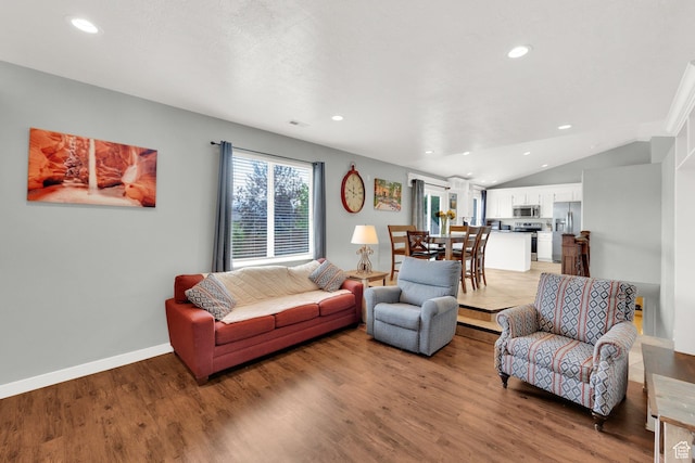 7215 S Aerie Hill Dr W, West Jordan, UT 84081 - living room with recessed lighting, light wood finished floors, vaulted ceiling, and baseboards