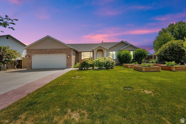 7215 S Aerie Hill Dr W, West Jordan, UT 84081 - single story home with driveway, brick siding, an attached garage, and a garden