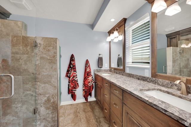 7215 S Aerie Hill Dr W, West Jordan, UT 84081 - bathroom featuring double vanity, a stall shower, and baseboards