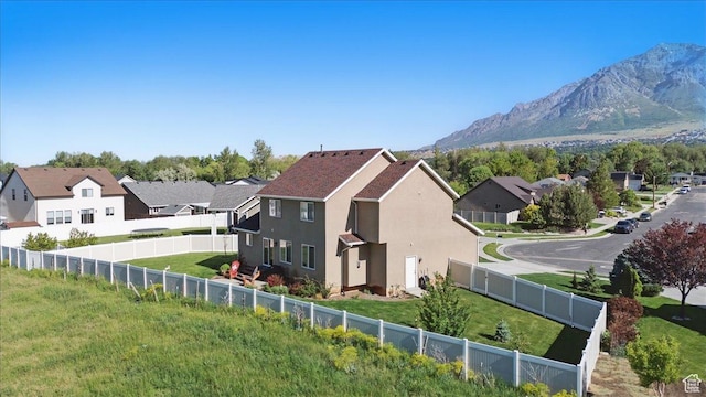 2007 N 850 E, North Ogden, UT 84414 - view of property exterior featuring stucco siding, a residential view, and a mountain view