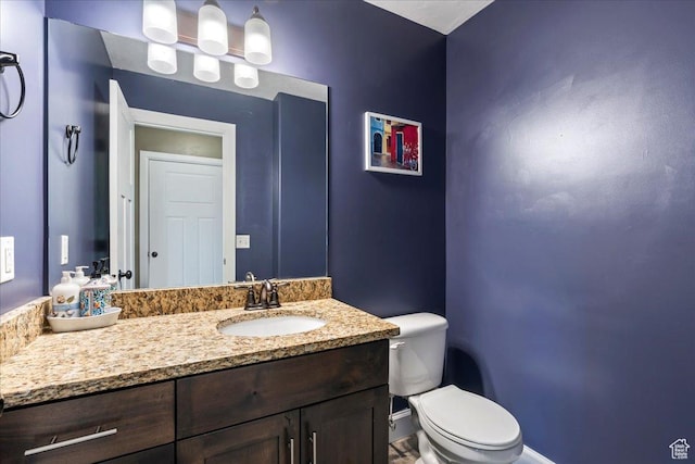 2007 N 850 E, North Ogden, UT 84414 - bathroom with toilet, vanity, and baseboards