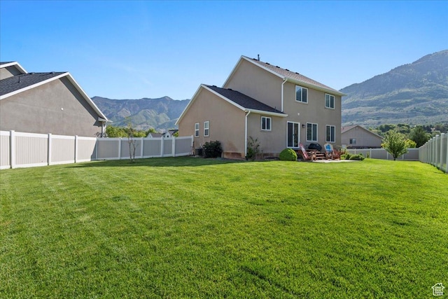 2007 N 850 E, North Ogden, UT 84414 - rear view of property featuring a mountain view and stucco siding