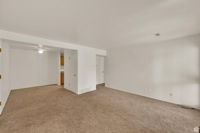 5323 S 560 E Unit D, Murray, UT 84107 - spare room with light carpet, ceiling fan, and baseboards