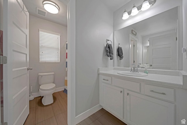 6178 W Sugarcane Dr, South Jordan, UT 84009 - bathroom featuring vanity, toilet, and baseboards