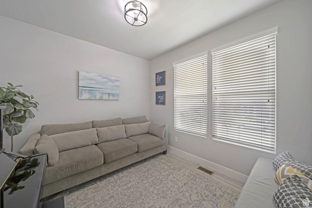6178 W Sugarcane Dr, South Jordan, UT 84009 - living area featuring baseboards and healthy amount of natural light