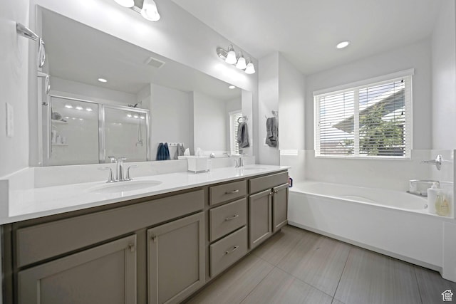 6178 W Sugarcane Dr, South Jordan, UT 84009 - full bathroom with a bath, double vanity, a stall shower, and recessed lighting