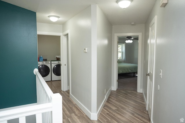 170 W 500 N, Wellsville, UT 84339 - hallway featuring washing machine and dryer and light wood finished floors