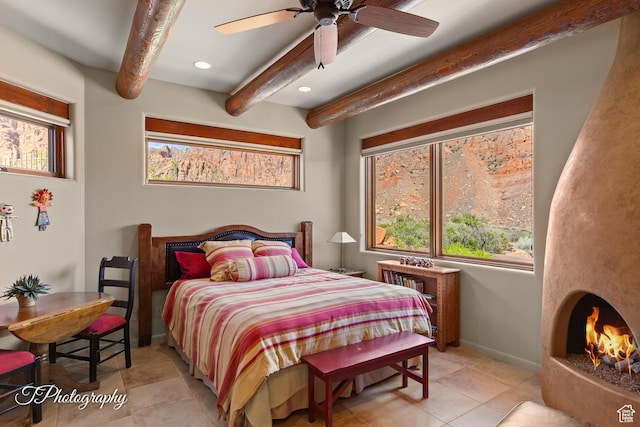 1936 N Uwan Dr, Ivins, UT 84738 - bedroom with beamed ceiling, multiple windows, recessed lighting, light tile patterned floors, and baseboards