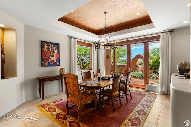 1936 N Uwan Dr, Ivins, UT 84738 - dining space with a chandelier, a raised ceiling, recessed lighting, light tile patterned floors, and baseboards