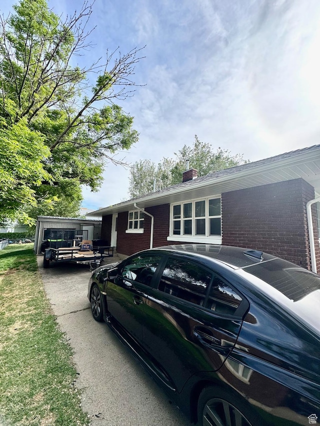 52 W 2000 N, Sunset, UT 84015 - single story home featuring brick siding and a chimney