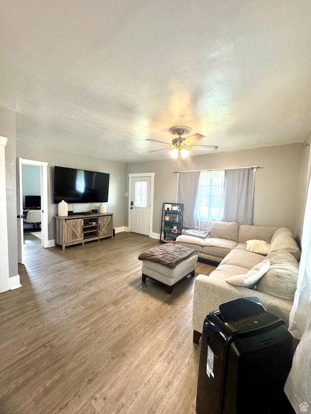 52 W 2000 N, Sunset, UT 84015 - living area featuring wood finished floors, ceiling fan, and baseboards