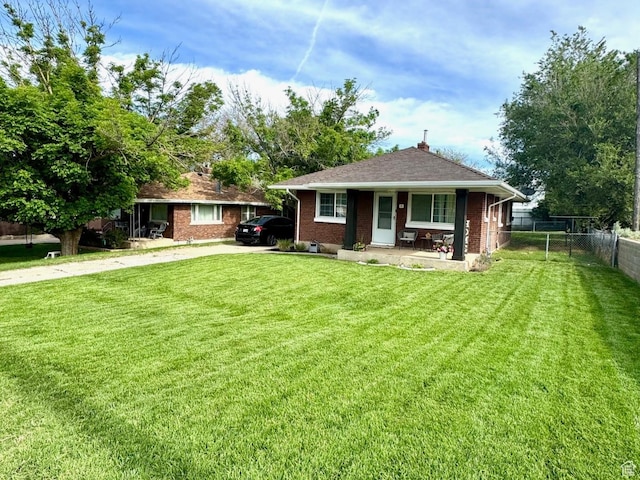 52 W 2000 N, Sunset, UT 84015 - view of front of house with covered porch and brick siding