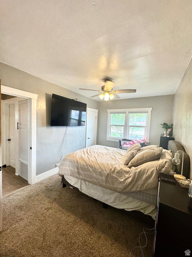 52 W 2000 N, Sunset, UT 84015 - bedroom with carpet flooring, a textured ceiling, ceiling fan, and baseboards