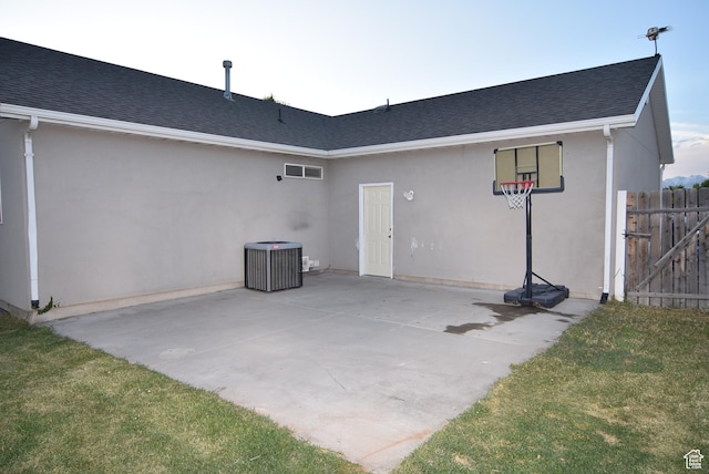 2236 E 1480 S, Spanish Fork, UT 84660 - back of property with central AC, a shingled roof, stucco siding, and a patio
