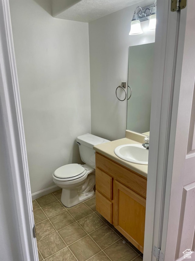 6939 S Florentine Way, West Jordan, UT 84084 - half bath featuring toilet, vanity, and tile patterned floors