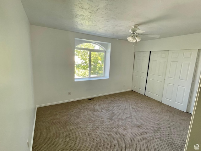 6939 S Florentine Way, West Jordan, UT 84084 - unfurnished bedroom with carpet, a closet, and a ceiling fan