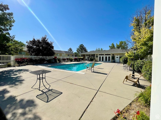 6939 S Florentine Way, West Jordan, UT 84084 - community pool with a patio and french doors