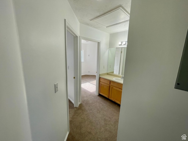 6939 S Florentine Way, West Jordan, UT 84084 - corridor featuring dark carpet and a textured ceiling