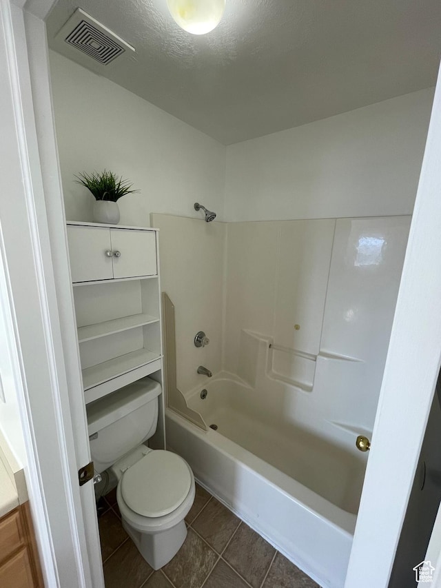 6939 S Florentine Way, West Jordan, UT 84084 - bathroom with washtub / shower combination and tile patterned flooring