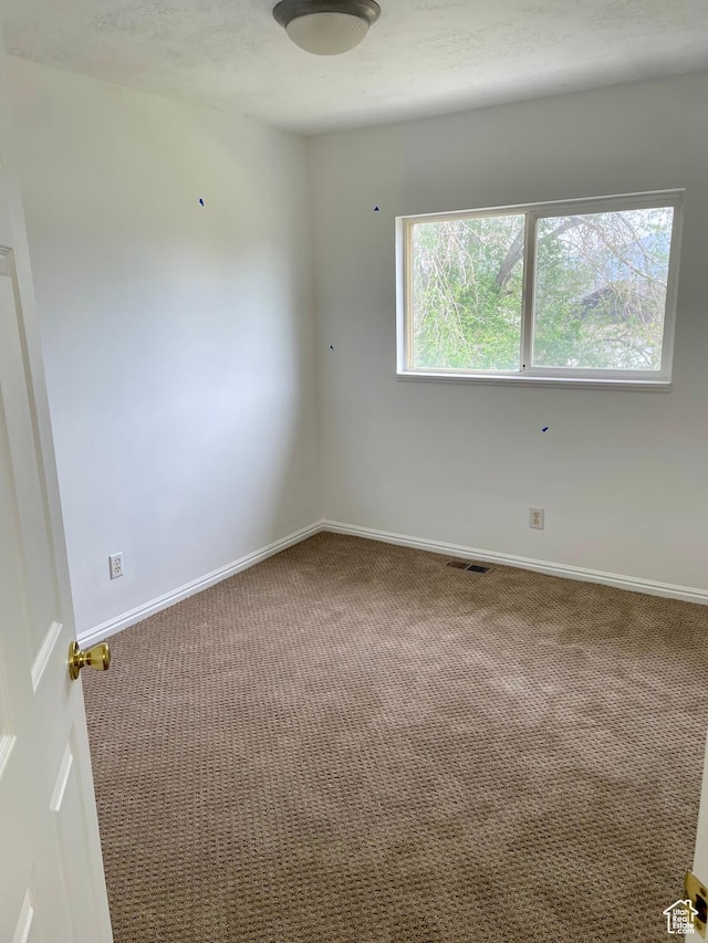 6939 S Florentine Way, West Jordan, UT 84084 - carpeted empty room with baseboards