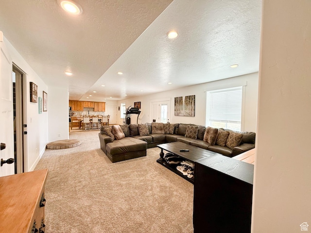 1384 E Abigail Ln, Eagle Mountain, UT 84005 - carpeted living room with a textured ceiling, recessed lighting, and baseboards