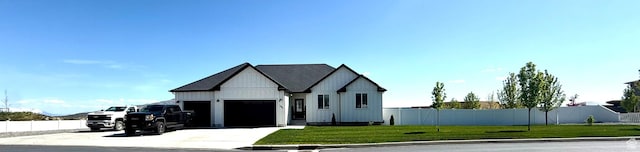 1384 E Abigail Ln, Eagle Mountain, UT 84005 - modern inspired farmhouse with an attached garage, concrete driveway, and board and batten siding