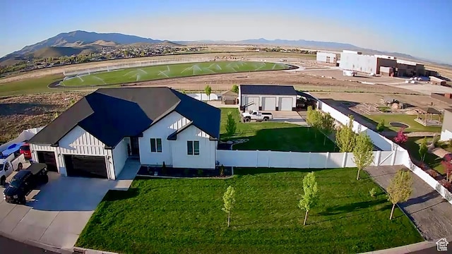 1384 E Abigail Ln, Eagle Mountain, UT 84005 - aerial view of residential area with a mountainous background