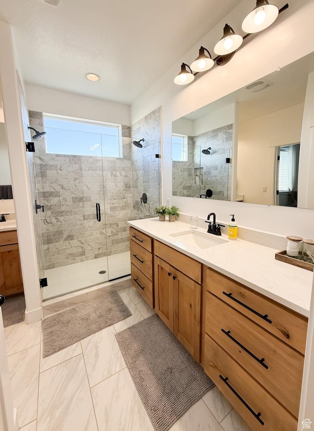 1384 E Abigail Ln, Eagle Mountain, UT 84005 - full bathroom featuring a shower stall, vanity, and marble finish floors