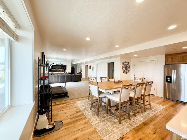 1384 E Abigail Ln, Eagle Mountain, UT 84005 - dining area featuring light wood-type flooring, plenty of natural light, and recessed lighting