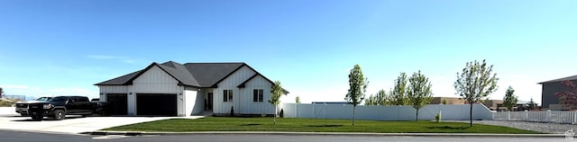 1384 E Abigail Ln, Eagle Mountain, UT 84005 - view of front facade with an attached garage and driveway