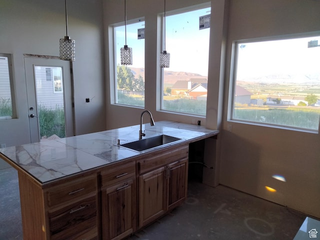 10960 N Anderson Way, Tremonton, UT 84337 - kitchen featuring a sink, healthy amount of natural light, and light countertops