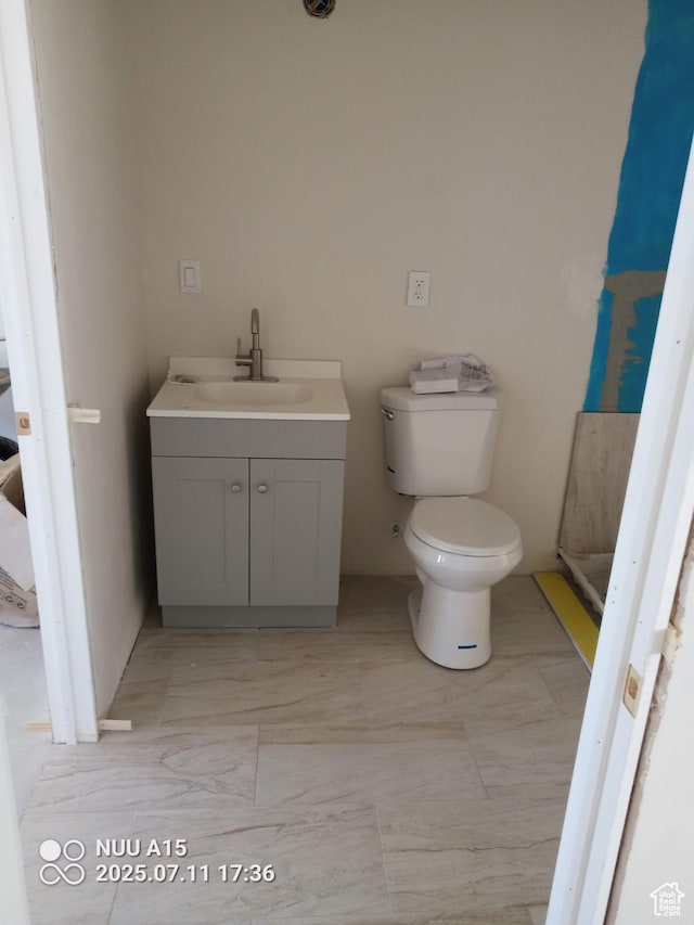 10960 N Anderson Way, Tremonton, UT 84337 - bathroom with toilet and vanity