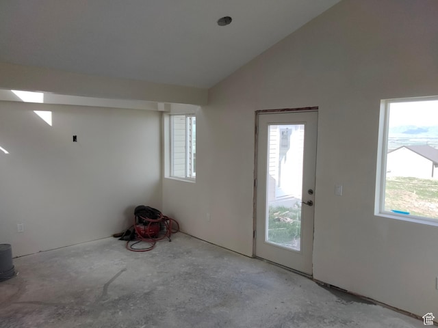 10960 N Anderson Way, Tremonton, UT 84337 - entryway with plenty of natural light, unfinished concrete floors, and lofted ceiling