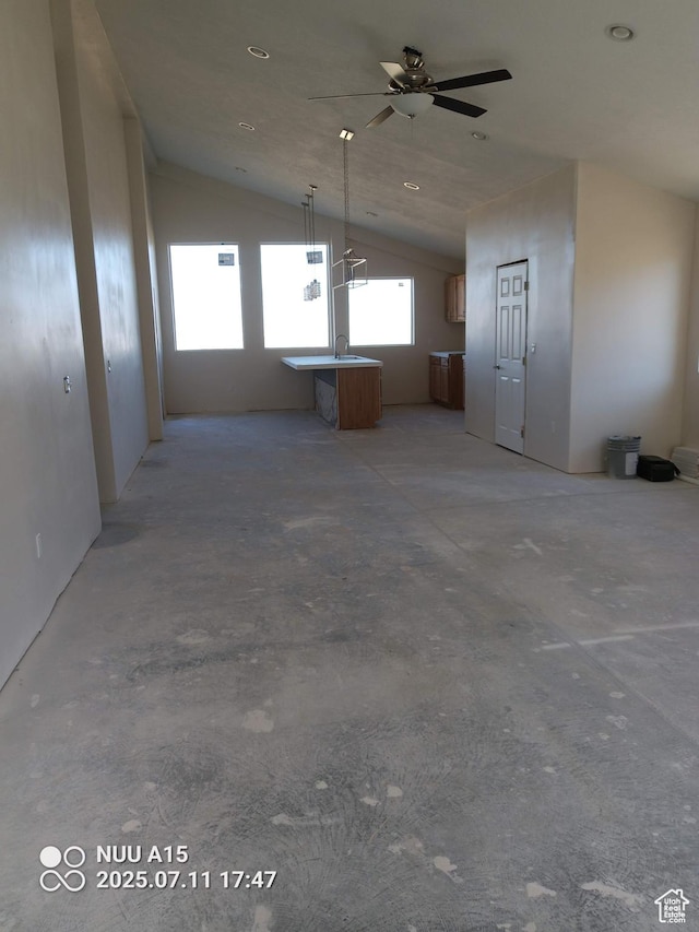 10960 N Anderson Way, Tremonton, UT 84337 - unfurnished living room with vaulted ceiling and a ceiling fan